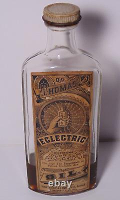 Old Vintage Antique Dr. Thomas Eclectric Oil Medicine Bottle Electricity Graphic