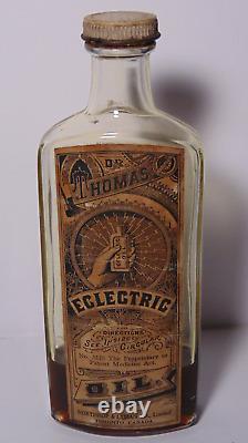 Old Vintage Antique Dr. Thomas Eclectric Oil Medicine Bottle Electricity Graphic
