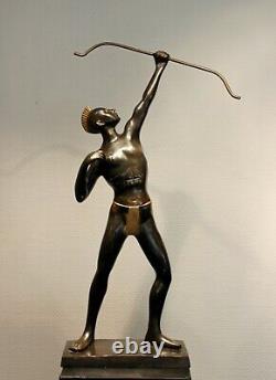 Old brass archer figure