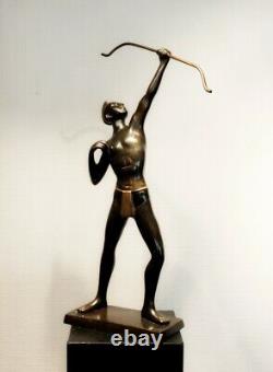 Old brass archer figure