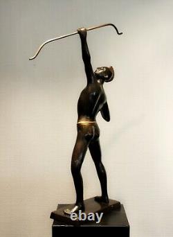 Old brass archer figure