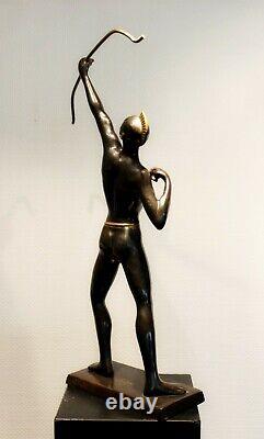 Old brass archer figure