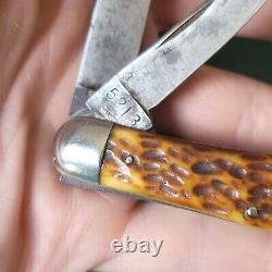 Ancien couteau de poche Ulster avec manche en os de cerf, style vintage et antique