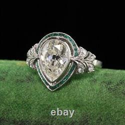 Antique Art Deco Platinum Old Pear Shape Diamond Emerald Halo Bague De Fiançailles