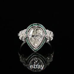 Antique Art Deco Platinum Old Pear Shape Diamond Emerald Halo Bague De Fiançailles