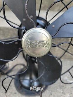 Translate this title in French: Ventilateur ancien vintage oscillant Westinghouse
