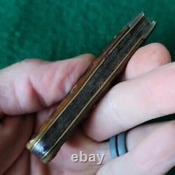 Vieux couteau de poche Jack Barehead Cattaraugus 21489 en os de cerf antique.